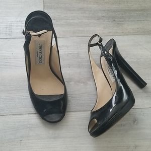 Black Jimmy Choo patent leather heels